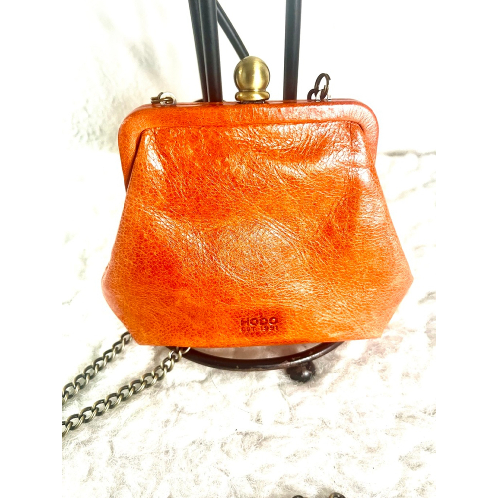HOBO vintage orange leather kiss-lock clutch purse with crossbody chain - Picture 2 of 6